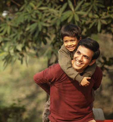 Child smiling with parent
